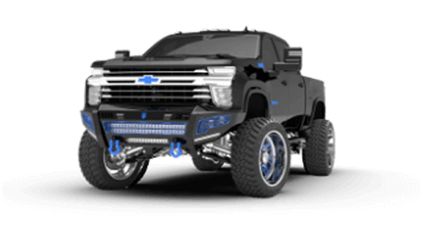 A white jeep parked on a large rock in an outdoor setting, showcasing its rugged tires and off-road capabilities.